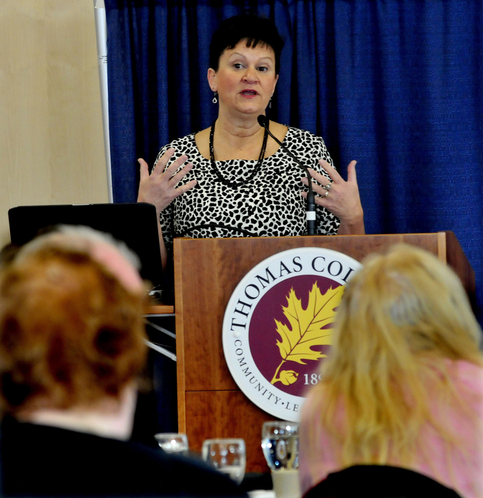 Director of the Maine Arts Commission Julie Richard speaks about how the support of arts benefits the state culturally and economically during a Mid-Maine Chamber of Commerce breakfast at Thomas College in Waterville on Thursday.
