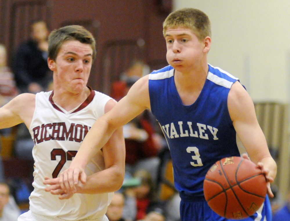 Valley’s Cody Laweryson, right, tries to get past Richmond’s Matt Holt during an East/West Conference game in Richmond earlier this season. Laweryson and the Cavaliers enter the D South tournament as the top seed and with plenty of expectations.