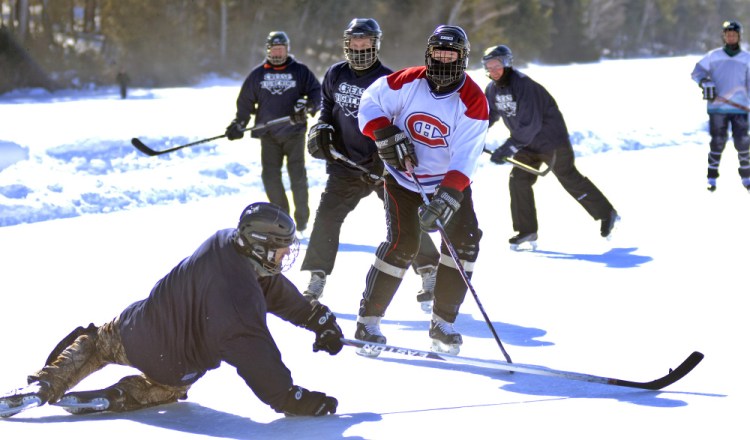 Some old-fashioned hockey breaks out Sunday during the Maine Pond Hockey Classic at the Snow Pond Center for the Arts in Sidney.
