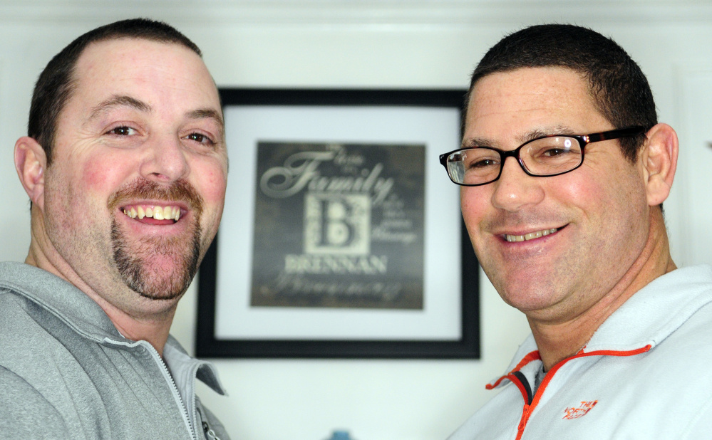 Brennan brothers pose for a photo on Saturday in Augusta. Travis Brennan, left, is planning to donate a kidney to his brother Todd Brennan.