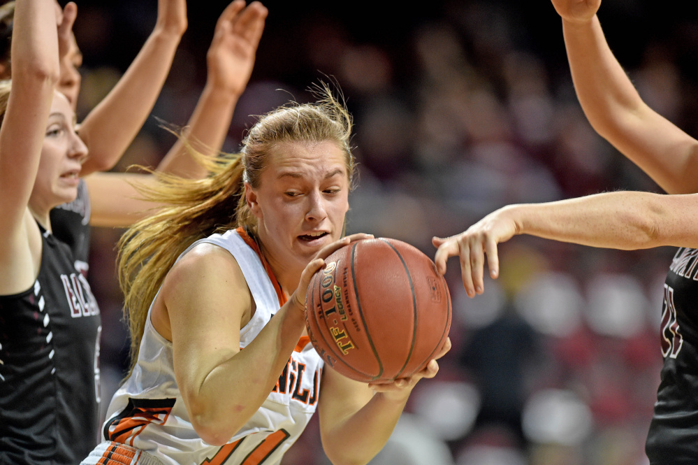 Winslow’s Heather Kervin looks for a little breathing room during a Class B North quarterfinal last Saturday against Ellsworth at the Cross Insurance Center in Bangor.