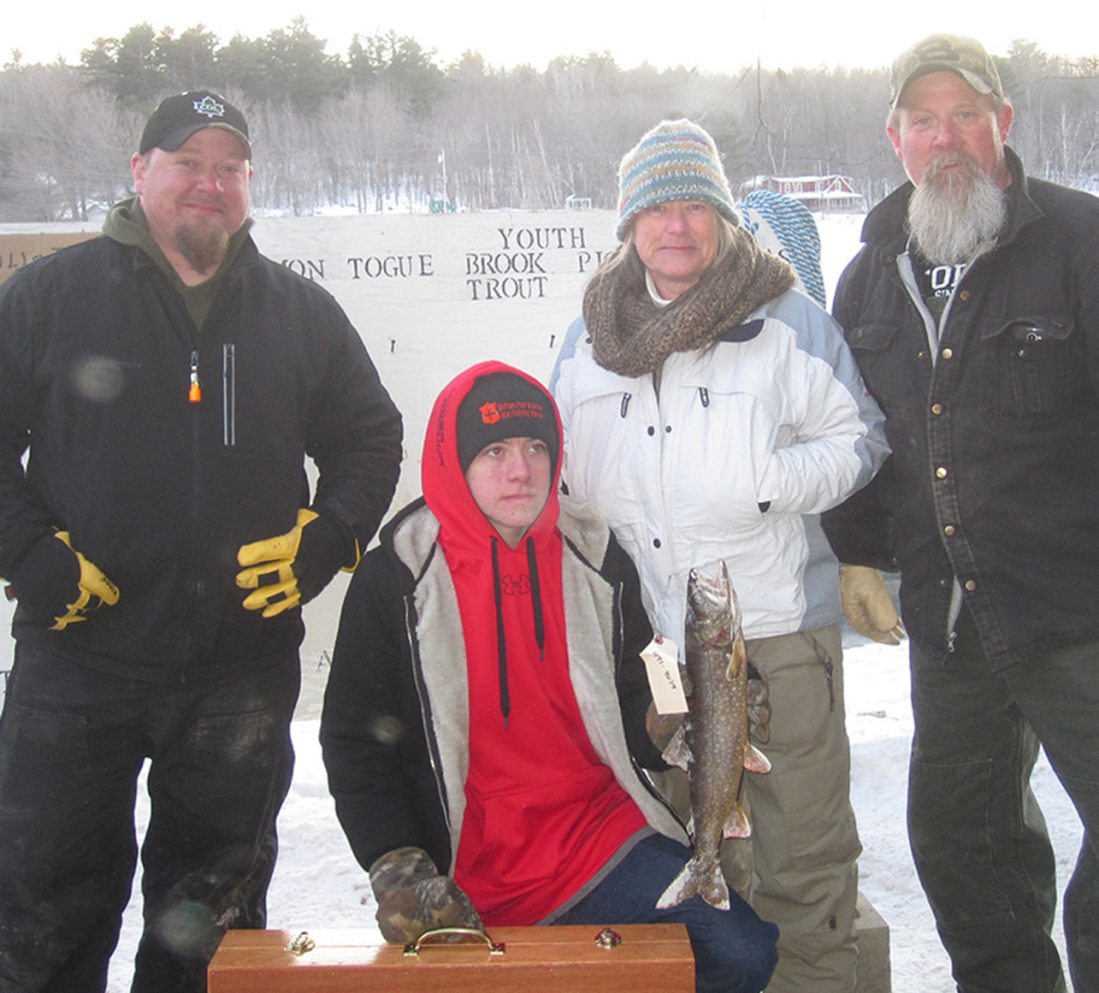 Fishing derby participants, from left are Jeff Jr. Rowe, Beau Smith, who one heaviest fish — youth division, Deb and Jeff Rowe.