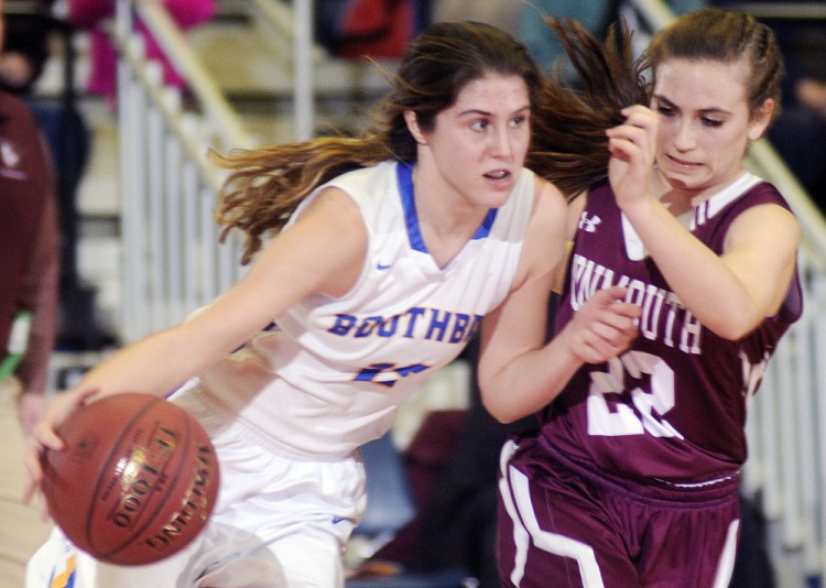 Monmouth Academy’s Sidney Wilson, right, keeps the pressure on Boothbay’s Kate Friant during a Class C South semifinal Thursday at the Augusta Civic Center.