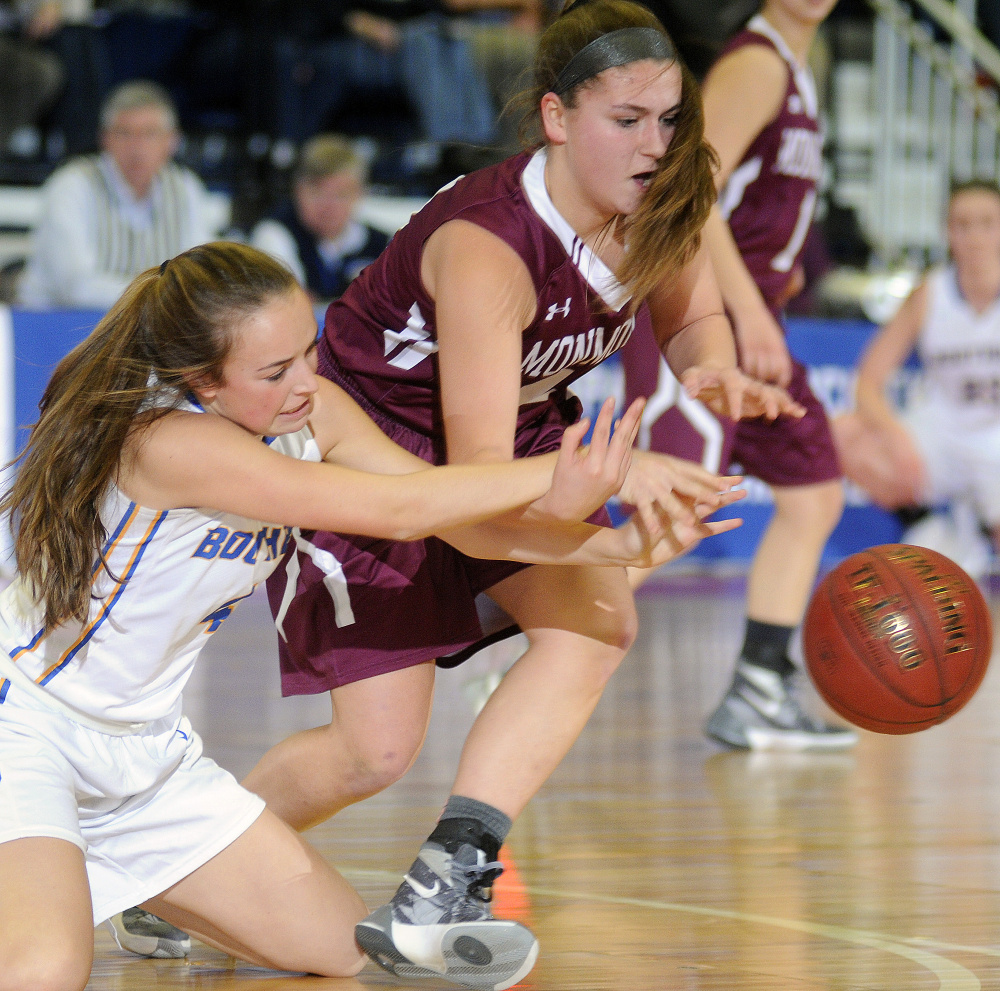 Monmouth Academy’s Haley West, right, dives for the ball with Boothbay’s Hannah Morley during a Class C South semifinal Thursday afternoon at the Augusta Civic Center.