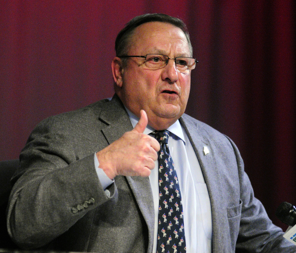 Gov. Paul LePage, shown here at a February town hall at Hall-Dale High School in Farmingdale, named Ken Mason sheriff on Thursday, although some say it wasn’t a legal appointment.