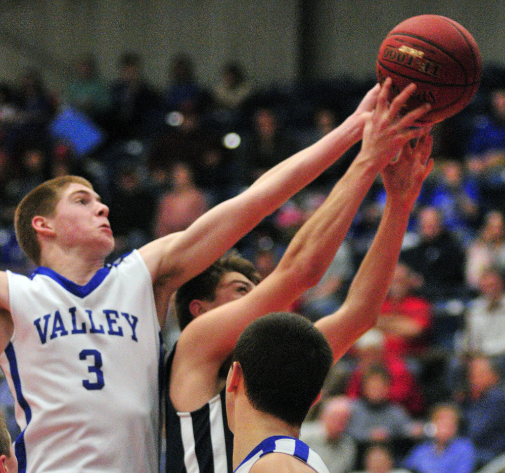 Valley’s Cody Laweryson rebounds against Greenville during a Class D South semifinal game Wednesday at the Augusta Civic Center.