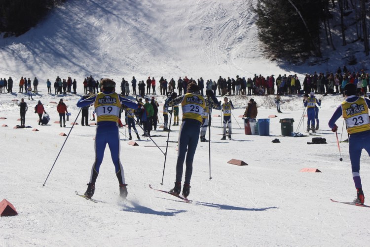 Mt. Blue Nordic skier Tucker Barber (25) heads to the finish line of the freestyle 5-kilometer race Friday at Titcomb Mountain. Barber finished second.