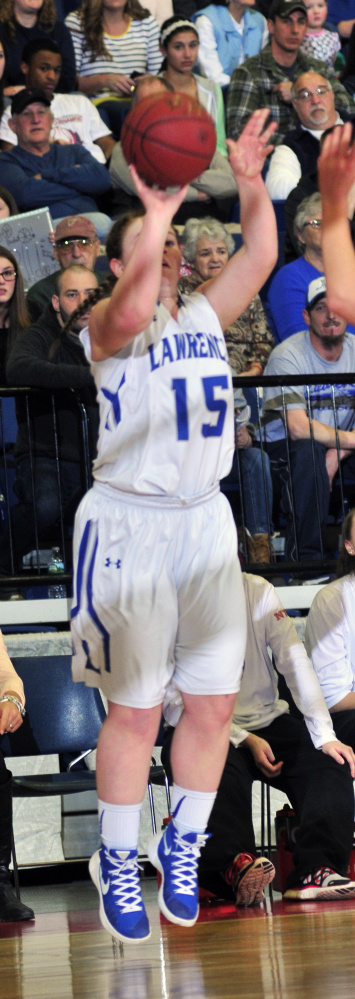 Lawrence sophomore forward Hunter Mercier lets go of a shot during the Class A North championship game Friday against Messalonskee at the Augusta Civic Center. Mercier made five 3-pointers and finished with 15 points in a 59-44 victory.