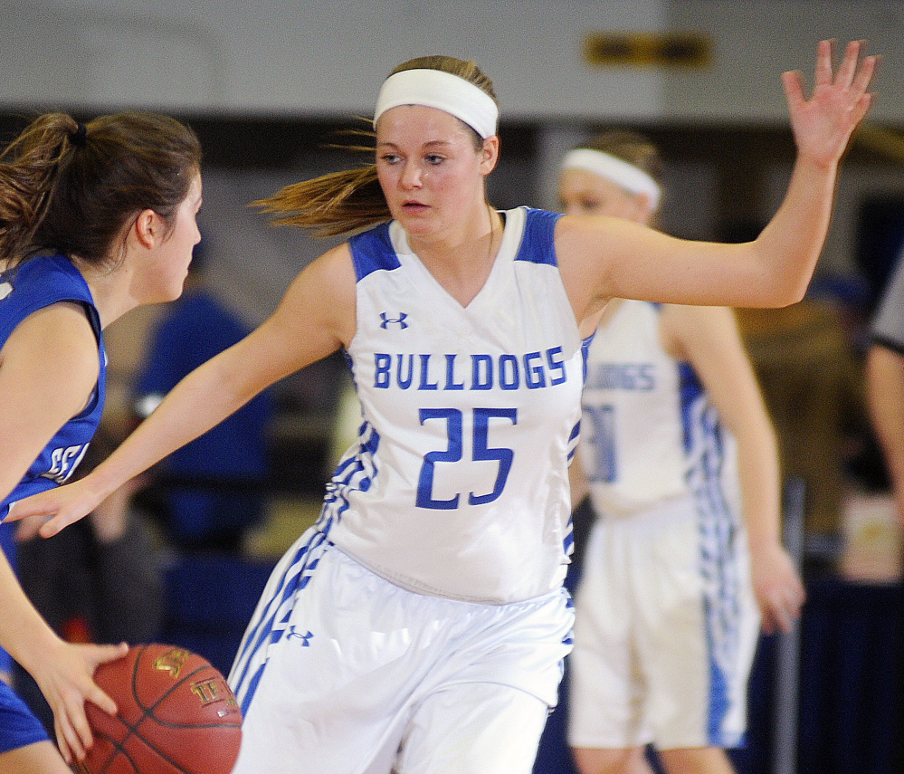 Madison's Emily Oliver, right, blocks Searsport's Melinda Ogden during Class C South semifinal Thursday.