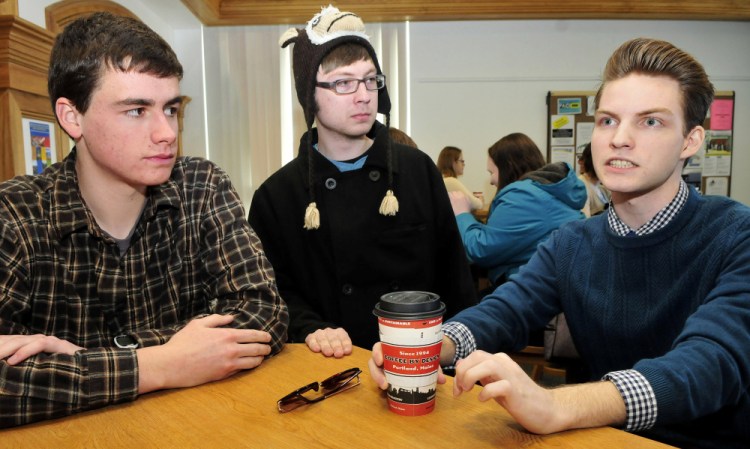 Members of the comedy improv group The Lawn Chair Pirates discuss their craft on Monday at the University of Maine at Farmington. From left are Nick Minor, Jagger Trouant and Aaron Verrill.