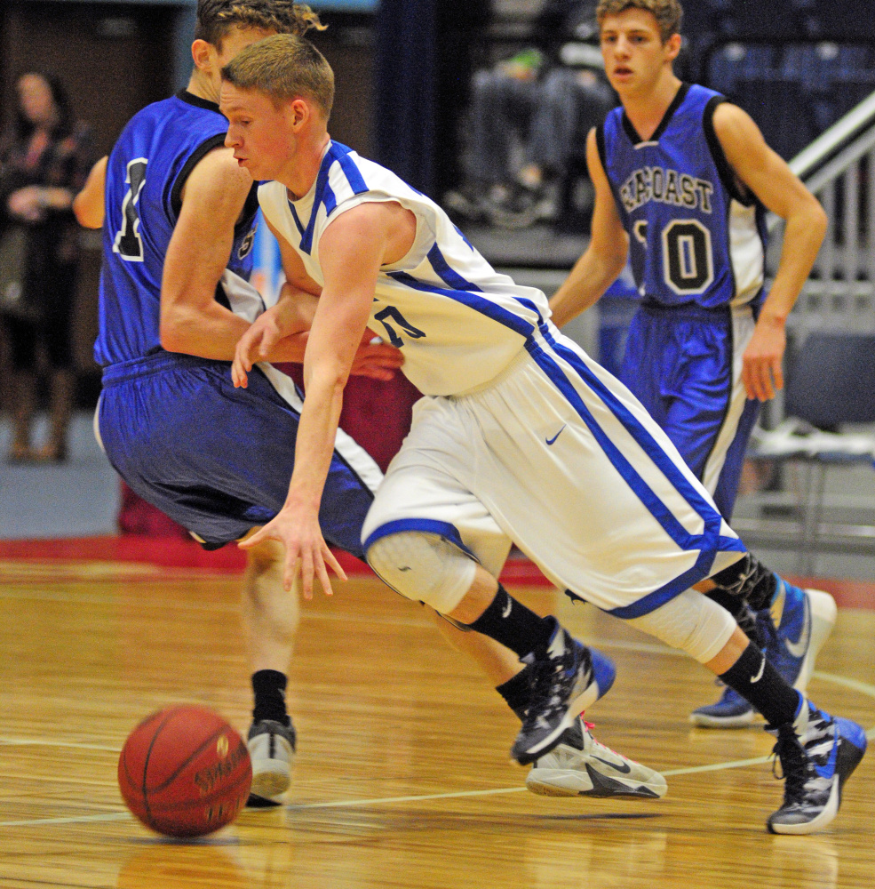Valley’s Luke Malloy drives to the hoop during the Class D South championship game Saturday at the Augusta Civic Center.