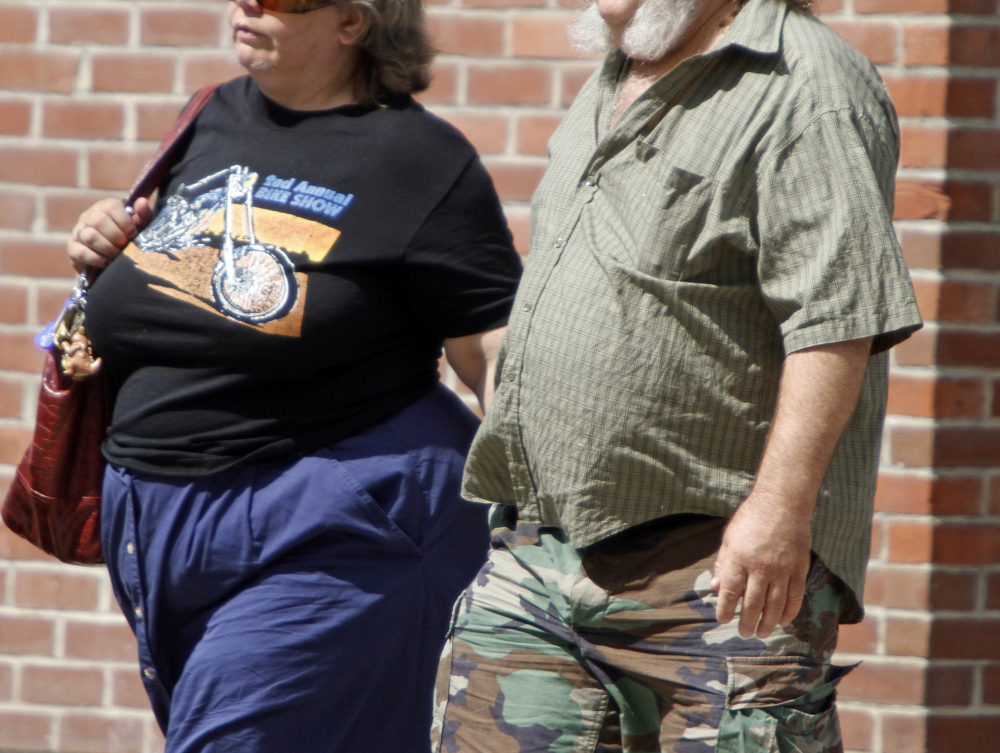 A study shows obesity in middle age is linked to earlier development of Alzheimer’s disease, researchers at the National Institutes of Health said Tuesday.