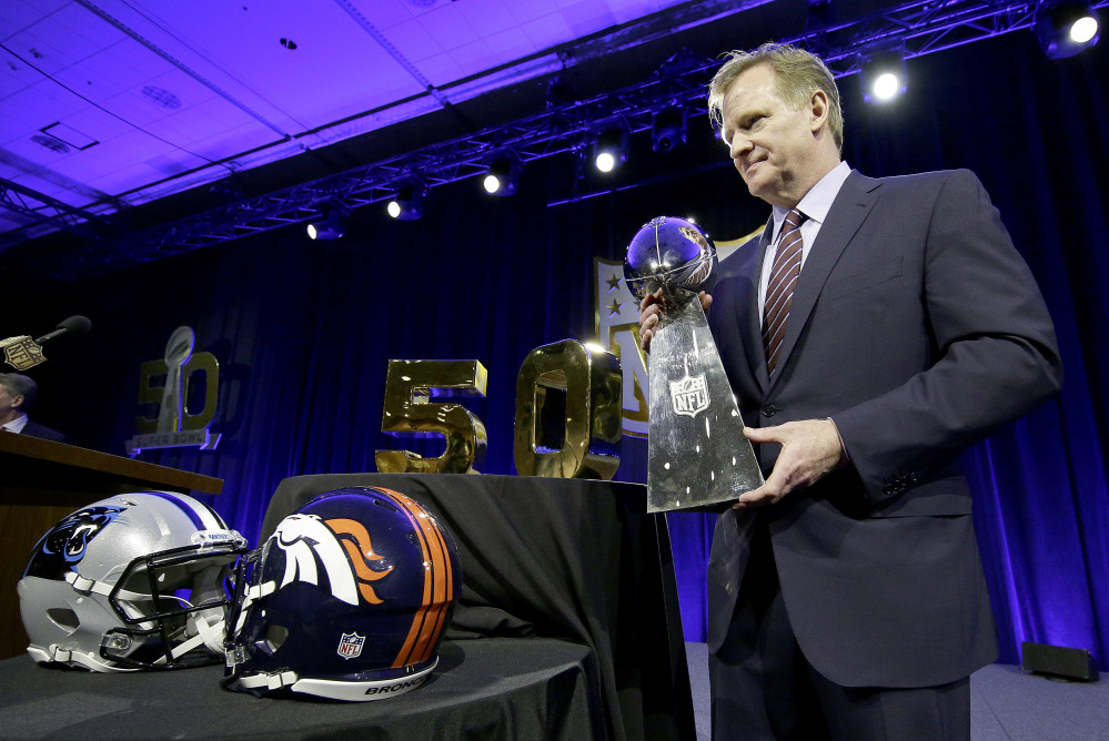 NFL Commissioner Roger Goodell poses with the Lombardi Trophy after his annual state-of-the-game news conference Friday in San Francisco.