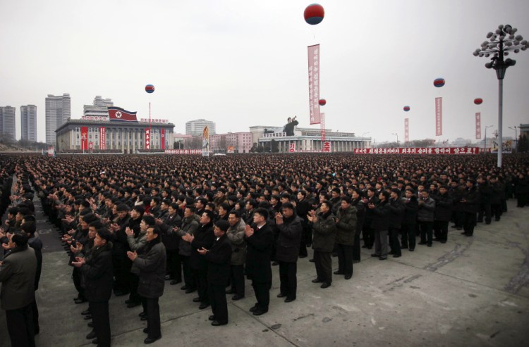 North Koreans gather at the Kim Il Sung Square to celebrate a satellite launch, Monday in Pyongyang, North Korea.