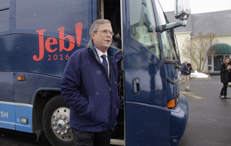 Republican presidential candidate, former Florida Gov. Jeb Bush steps off his bus as he arrives at a campaign event, Monda in Nashua, N.H. 