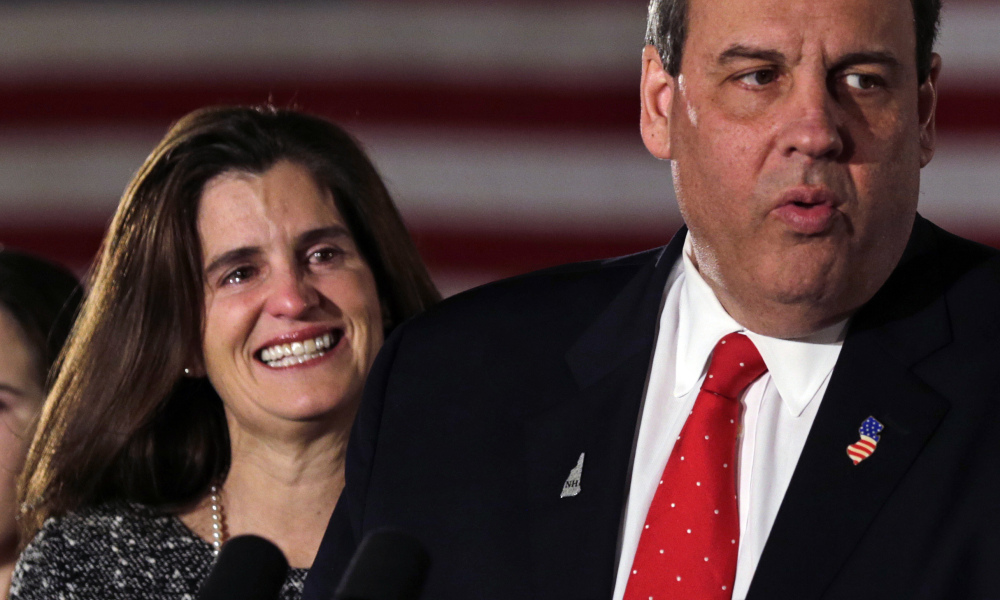 Tears well up in Mary Pat Christie’s eyes as her husband, Republican presidential candidate New Jersey Gov. Chris Christie, addresses supporters during a primary night rally in Nashua, N.H., on Tuesday, where he finished behind most rivals.