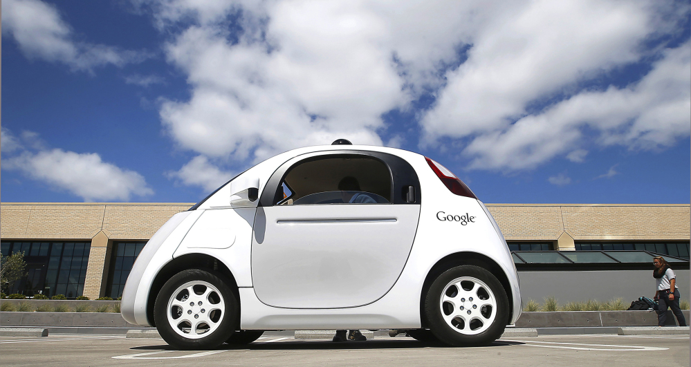 Google’s self-driving car is shown in May on the campus in Mountain View, Calif. The federal government’s highway safety agency agrees with Google: Computers that will control the cars of the future can be considered their drivers.