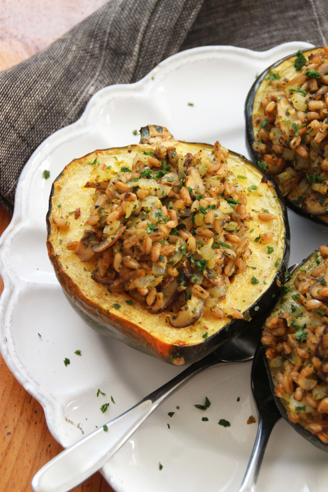 And since the bowl-like shape of the squash just begs to be filled, we created a mushroom-farro stuffing spiked with lemon zest and juice. 

The Associated Press