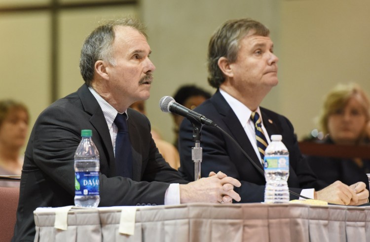 Charles Baird, left, former second mate of the El Faro, answers questions Thursday during the Coast Guard hearing on the sinking of the cargo ship. Baird testified that he was at home when he saw news of Hurricane Joaquin on television and texted Capt. Michael Davidson to make sure he was aware of it.