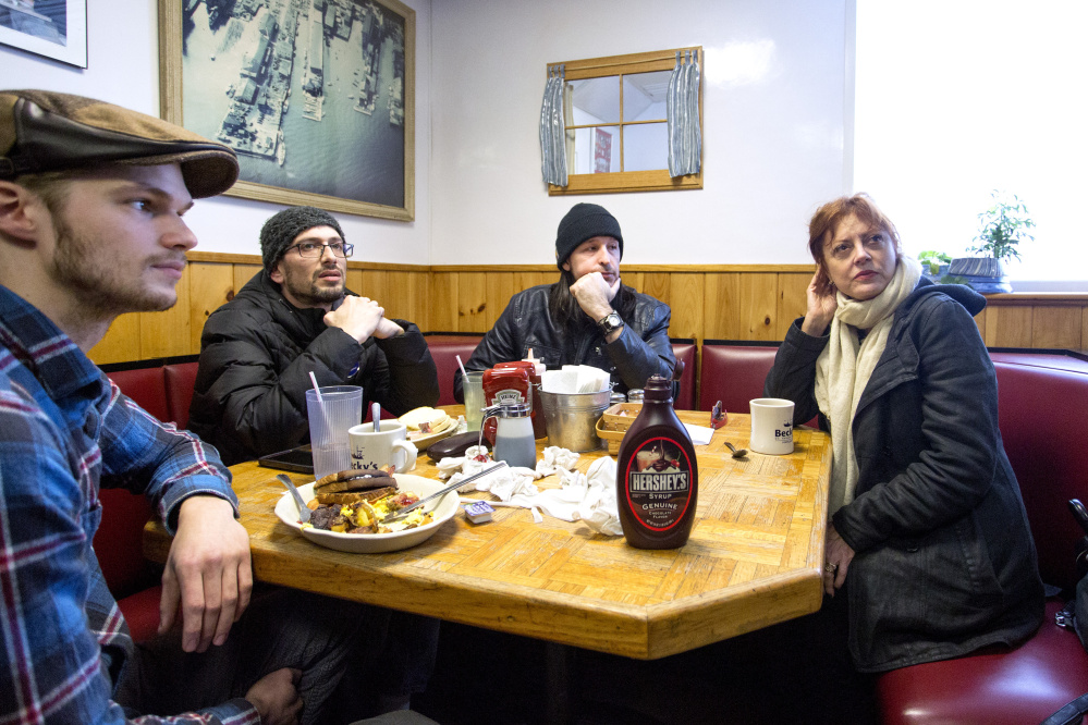 Actress Susan Sarandon sits with Mike Maurice, 24, of Biddeford, Mat Zimmerman, 42, of Portland and Sean Slaughter, 44, of Cape Elizabeth during a visit to Becky’s Diner in Portland on Tuesday as she made a handful of stops around Maine to endorse Democratic presidential candidate Bernie Sanders.