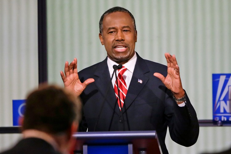 Republican presidential candidate and retired neurosurgeon Ben Carson answers a question during a Republican presidential primary debate, on  Jan. 28. His senior staff, which was restructured in late December after several advisers resigned, will not change, the campaign says. The Associated Press