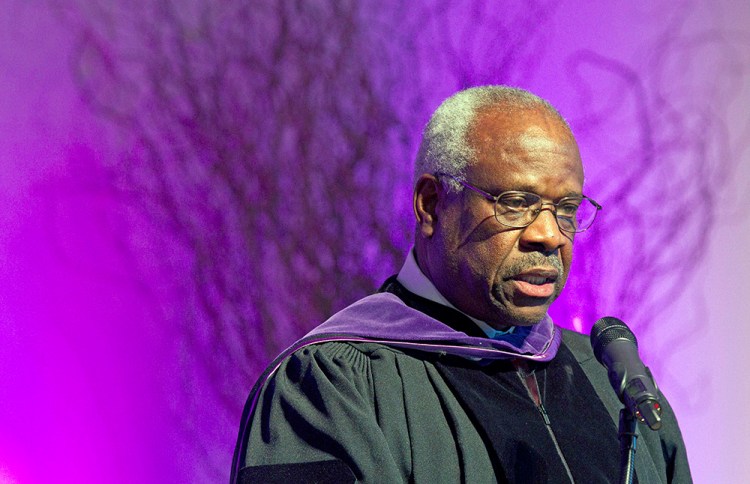 Supreme Court Justice Clarence Thomas speaks at College of the Holy Cross in Worcester, Mass., in this Jan. 26, 2012, photo. The Associated Press