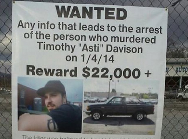 In this Jan. 6, 2015, photo,  a sign posted on a fence in Pennsylvania helped keep the death of Timothy ‘Asti’ Davison in the public eye.