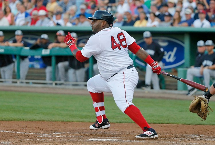 Pablo Sandoval, whose defense and weight have been issues this spring, isn't a sure thing to be the Red Sox starting third baseman, even with his fat contract.
The Associated Press