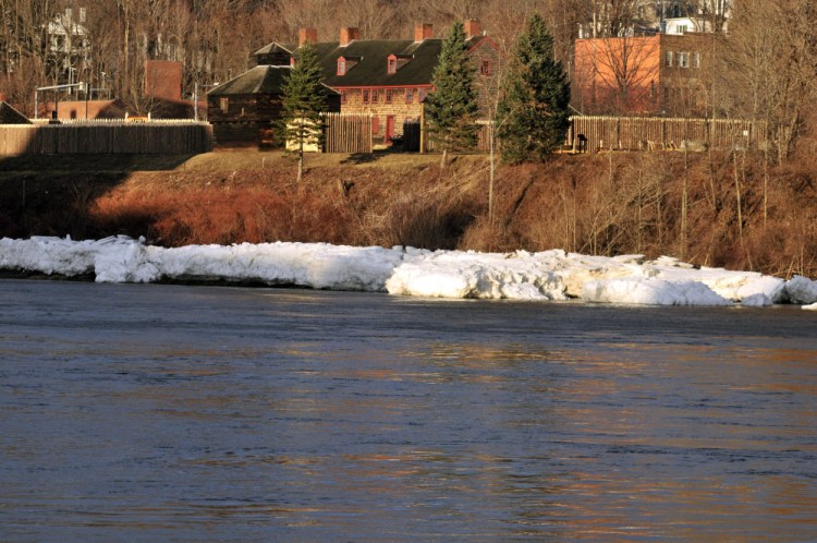 Old Fort Western is seen behind the open waters of the Kennebec River on Wednesday in Augusta.
