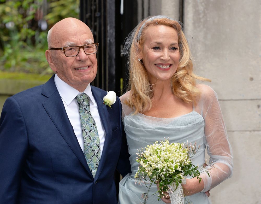 Media proprietor Rupert Murdoch and Jerry Hall pose outside St Bride’s Church in London for a ceremony to celebrate their wedding on Saturday.