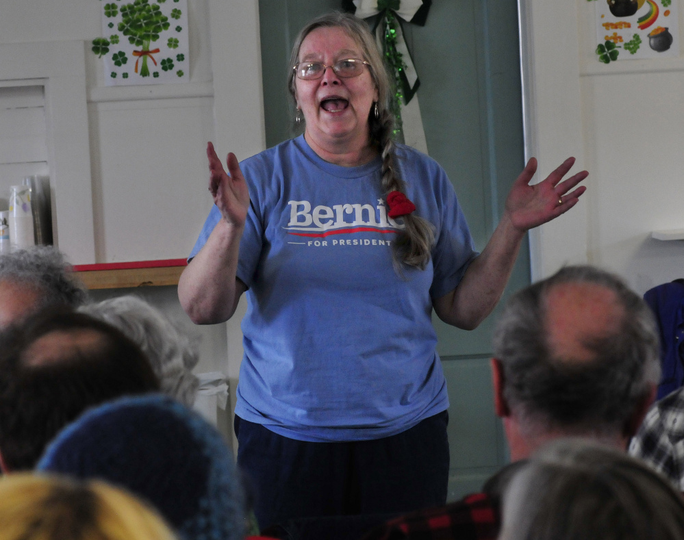 Wilton resident and Bernie Sanders supporter Eileen Adams pitches for her candidate during the Wilton Democratic caucus on Sunday.
