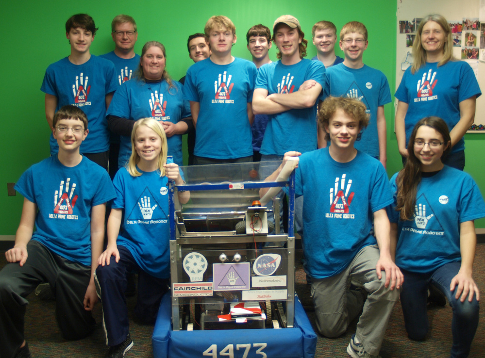 Hall-Dale High School’s REM Delta Prime Robotics team, in back, from left, are Neil Stottler, Robert Nitzel, Karen Giles, Micah Thomas, Barry Nitzel, John Wallace, Colt Seigars, Ethan Williams, Isaac Lawrence and Sarah Hodgkins. In front, from left, are Ben Hodgkins, Eli Spahn, William Fahy and Anna Schaab.