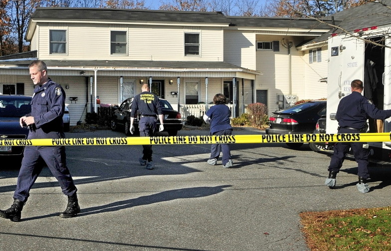 Investigators work at the scene of  the death of Jillian Jones in this Nov. 14, 2013 file photo taken at 32 Crosby St. in Augusta.