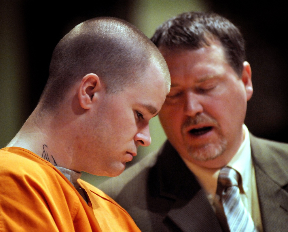 Corey Swift confers with his attorney James Billings in this 2008 file photo taken in Kennebec County Superior Court during Swift’s sentencing for his role in the killing of Jean Paul Poulain in 2007.