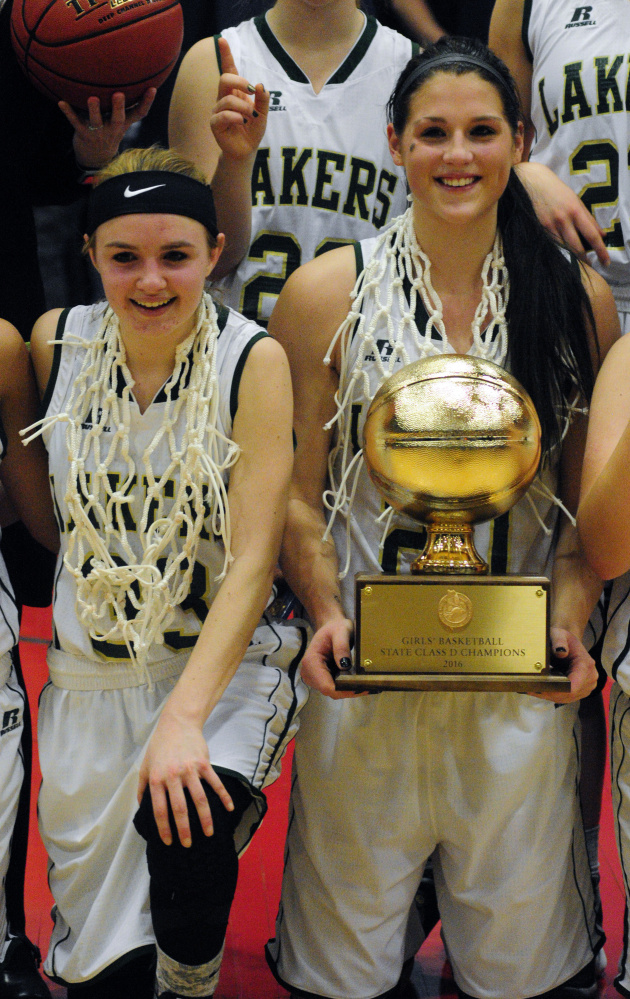 In this Feb. 27 photo, Rangeley captains Maddison Egan, left, and Blayke Morin are all smiles after winning the Class D girls basketball state championship at Augusta Civic Center. Morin scored 17 points on Saturday while playing for the South regional team in the Class C/D girls basketball all-star game in Bangor.