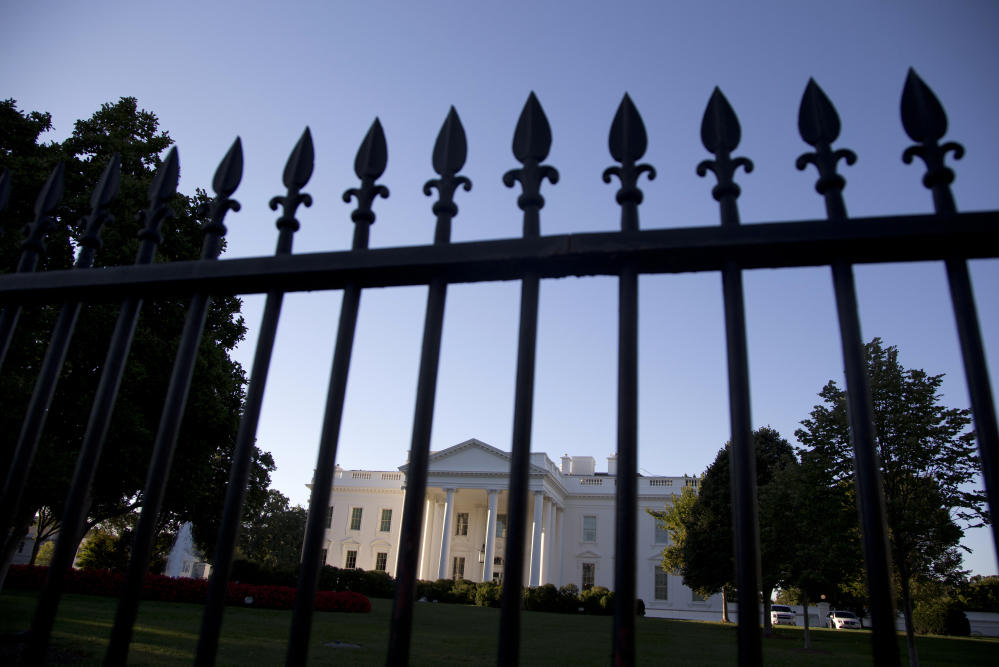 In this Sept. 22, 2014, file photo, the White House is photographed from Pennsylvania Avenue in Washington.