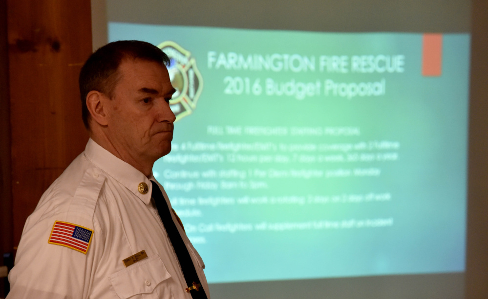 Farmington Fire Chief Terry Bell listens to questions during an informational meeting about the department budget request, which proposes adding four full-time firefighters to the volunteer force.