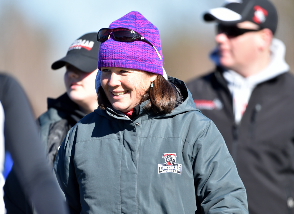 Thomas College women’s lacrosse coach Deb Biche-Labbe smiles after a game against St. Joseph’s on Saturday at Thomas College in Waterville.