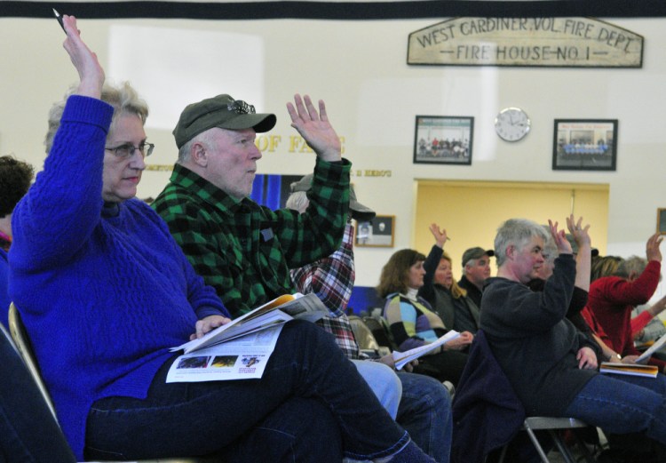 Residents vote during the annual West Gardiner Town Meeting on Saturday in the West Gardiner fire station.