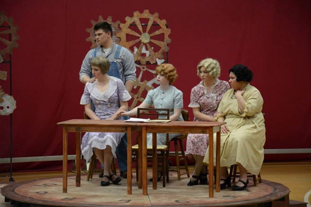 MCI students, left to right, Curtis McLeod, Mikayla Carr, Harmony Austin, Emily Richmond and Miranda Torres, perform “These Shining Lives.” The performance got the runnerup nod in the Maine Drama Festival over the weekend. Winner Lisbon High School is opting not to go to the New England Drama Festival, so the MCI troupe will go instead.