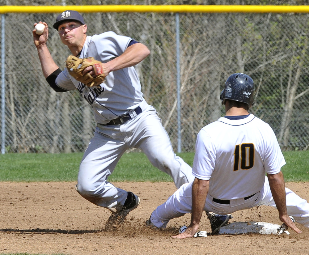 In this May 8, 2015 photo, USM’s Sam Dexter makes the double play after getting out UMass-Dartmouth’s Ryan Mederios at second during the Little East Conference winners’ bracket final in Gorham.