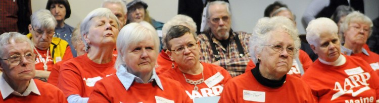 Seniors get ready to lobby legislators at the State House Monday to encourage them to support a resolution to require the governor to release bonds to provide housing.
