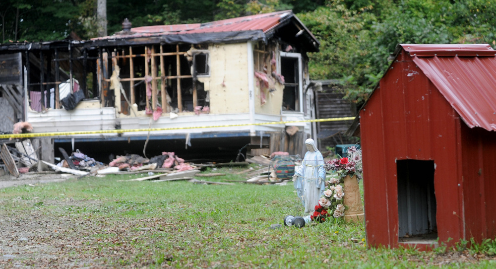 A neighbor is charged with setting a mobile home at 289 Brown’s Corner Road in Canaan on fire in September, and acquaintances of the man charged with the fire told police he didn’t like the owners’ sexuality.