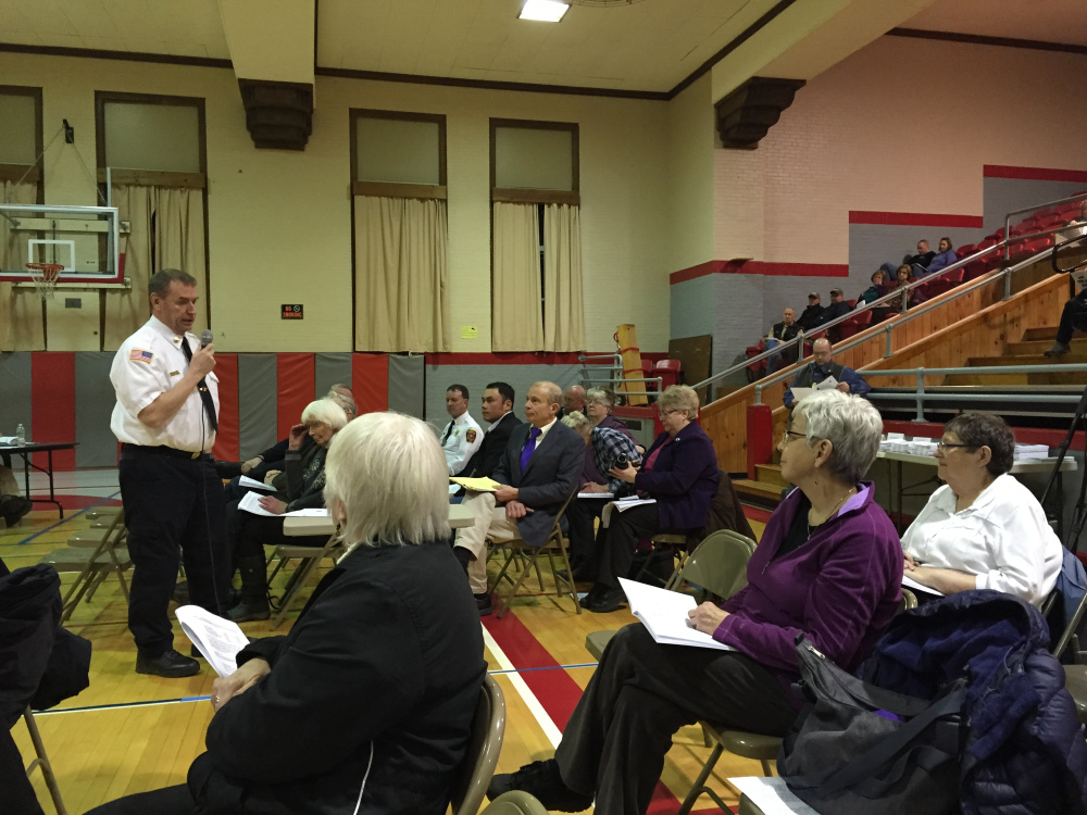 Fire Chief Terry Bell addresses residents’ questions during the discussion of the Fire Department’s budget request, which included the addition of four full-time firefighters to the department.