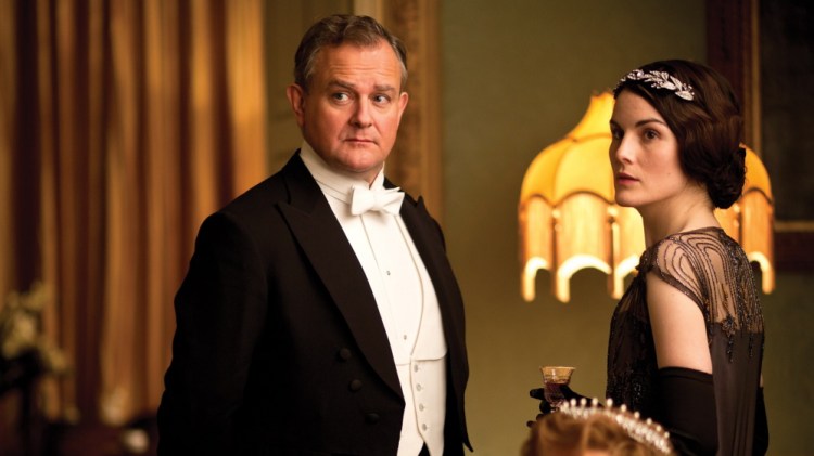 Hugh Bonneville plays Robert Crawley and Michelle Suzanne Dockery is Lady Mary Crawley in the period drama series “Downton Abbey.”