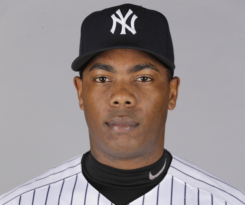 Aroldis Chapman agreed to accept a 30-game suspension under Major League Baseball’s domestic violence policy, a penalty stemming from an incident with his girlfriend last October. Under the discipline announced Tuesday, Chapman will serve the penalty from the start of the season in April. (AP Photo/Chris O’Meara, File)