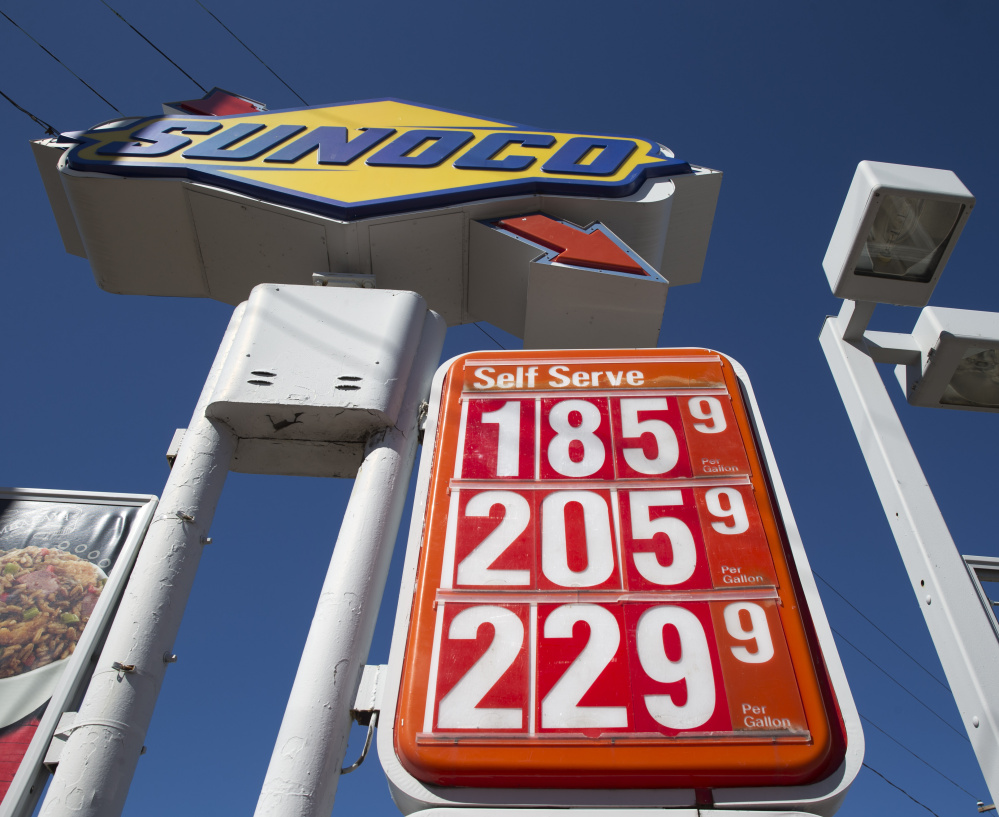 Gas prices are posted at a filling station Wednesday in Philadelphia. The national average price has risen for eight straight days – the first time that has occurred since last May.
