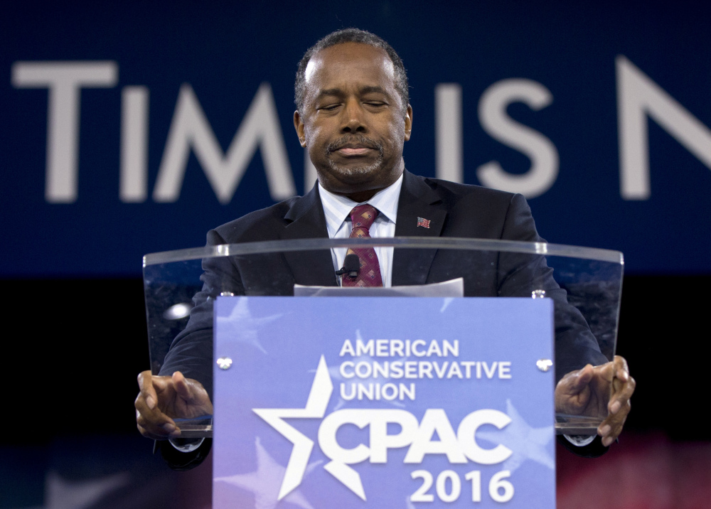 Ben Carson addresses the Conservative Political Action Conference (CPAC), Friday in National Harbor, Md. He is ending his presidential campaign.