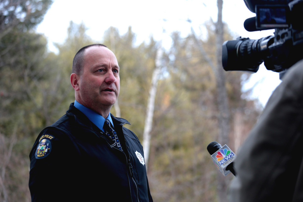 Maine State Police Sgt. Chris Harriman speaks too the media about a fatal shooting at 331 Hancock Pond Road in Sebago on Saturday.