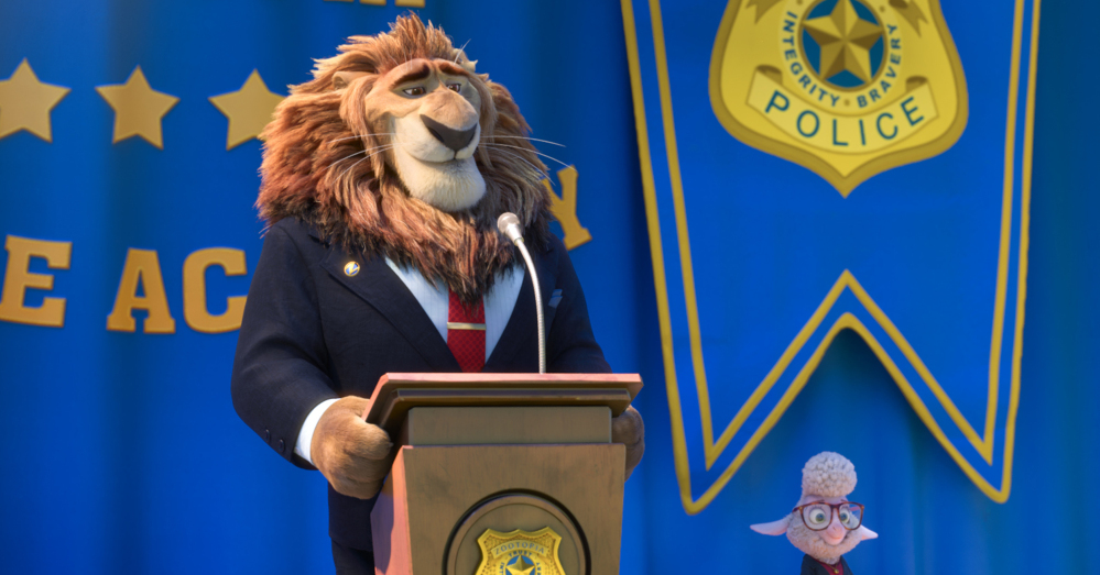 Mayor Lionheart, voiced by J.K. Simmons, left, and Assistant Mayor Bellwether, voiced by Jenny Slate, appear in a scene from the animated film “Zootopia.”